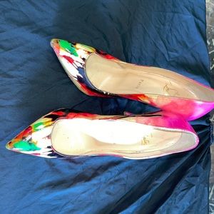 Floral Louboutin patent pumps